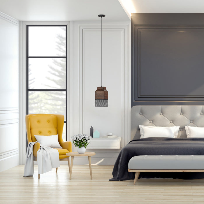 1-Light Black Metal Cage and Brown Wood Pendant in a modern bedroom with yellow armchair, bed, and window