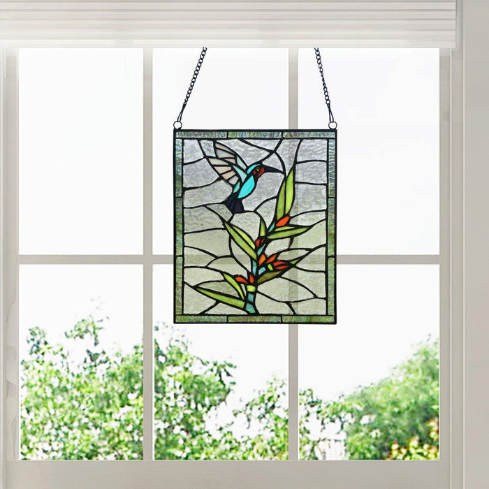 10" H Happy Hummingbird Stained Glass Window Panel hanging in front of a window.