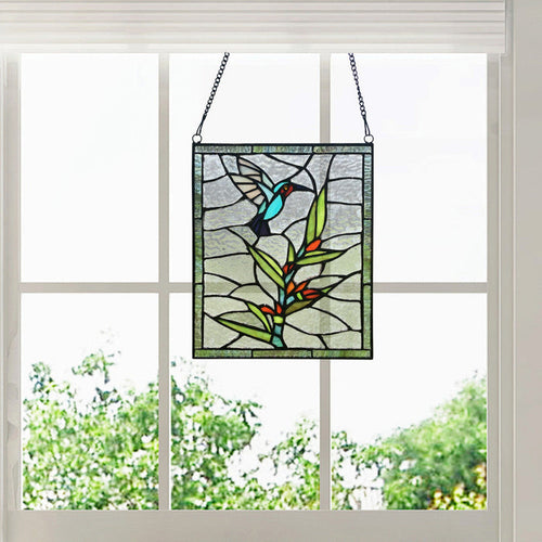 10" H Happy Hummingbird Stained Glass Window Panel hanging in front of a window.