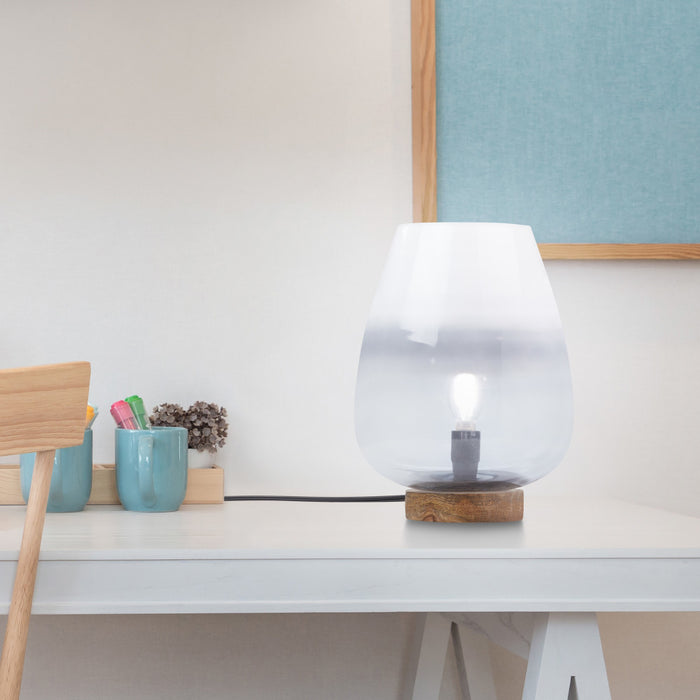 10.5" H Briggs Blue/White Ombre Globe-Like Shade Accent Lamp with a Mango Wood Block Base on a desk.