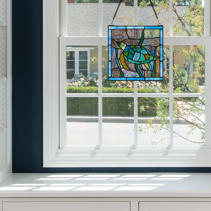 10.5"H Tommy the Green Sea Turtle Stained Glass Window Panel
hanging on a window