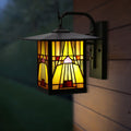 11.75"H Mission 1-Light Stained Glass Oil Rubbed Bronze Outdoor Light Fixture on an exterior wall.