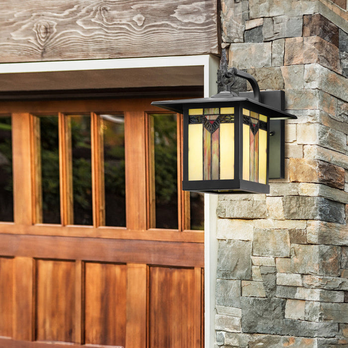 11.75"H Prairie 1-Light Stained Glass Black Outdoor Light Fixture on a stone exterior garage wall