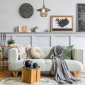 11.8" W 1-Light Charley Glass and Metal Pendant in a cozy living room with a gray sofa, wooden coffee table, and decorative elements.