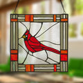 11"H Carol the Cardinal Stained Glass Window Panel hanging against a blurred natural background.