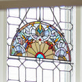 11"H Victorian Corista Half-Moon Stained Glass Window Panel hanging in window