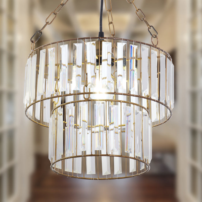 12" W 1-Light Constance Glass and Metal Pendant in a blurred indoor setting