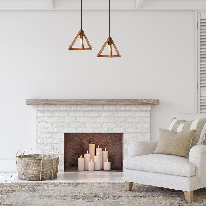 12" W Beverly Metal and Mango Wood Novelty Pendant in a living room with white brick fireplace, candles, and a beige sofa.