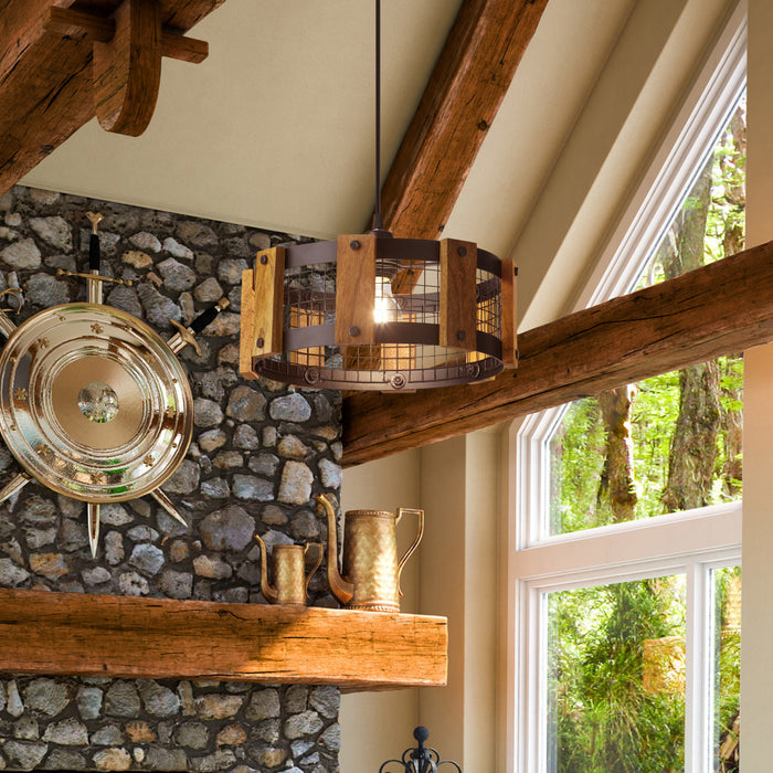 12" W Mattie Black Painted Metal Pendant Light with Wood Shade in a living room with vaulted ceiling, exposed wood and stone fireplace
