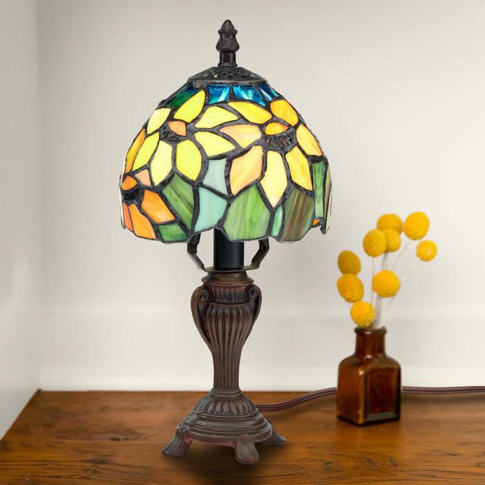 12"H Stained Glass Sunflower Blossoms Accent Table Lamp on a wooden surface.