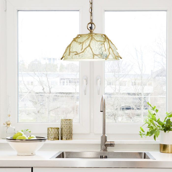 13" 1-Light Gold Metal and Silver Glass Pendant in a modern kitchen with a sink and countertop
