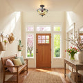 13" H Amelia Red and Amber Stained Glass Shade Traditional Ceiling Light in a foyer with wooden bench and flowers on a table.