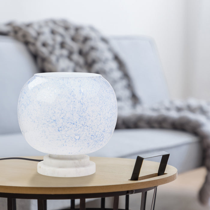 13" H Nautical White/Blue Globe Shade Stacked Base Accent Lamp on a wooden table with a blurred sofa in the background