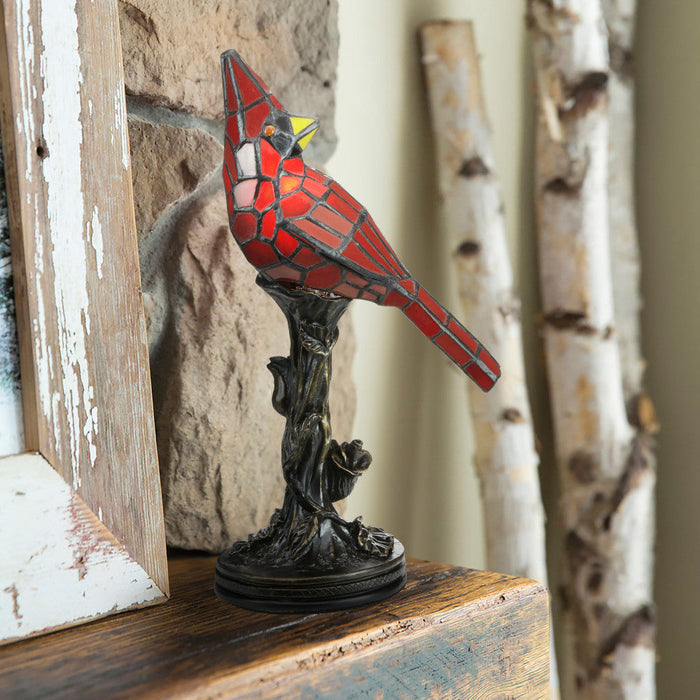13.5"H Cardinal Stained Glass Bird Accent Lamp on a rustic wooden surface