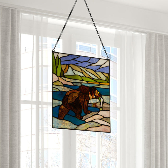 14" H Bear Stained Glass Window Panel hanging in front of a window