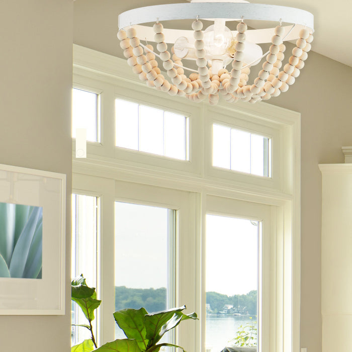 15" Delilah Boho Semi-Flush Mount Ceiling Fixture in a room with large windows and a plant.