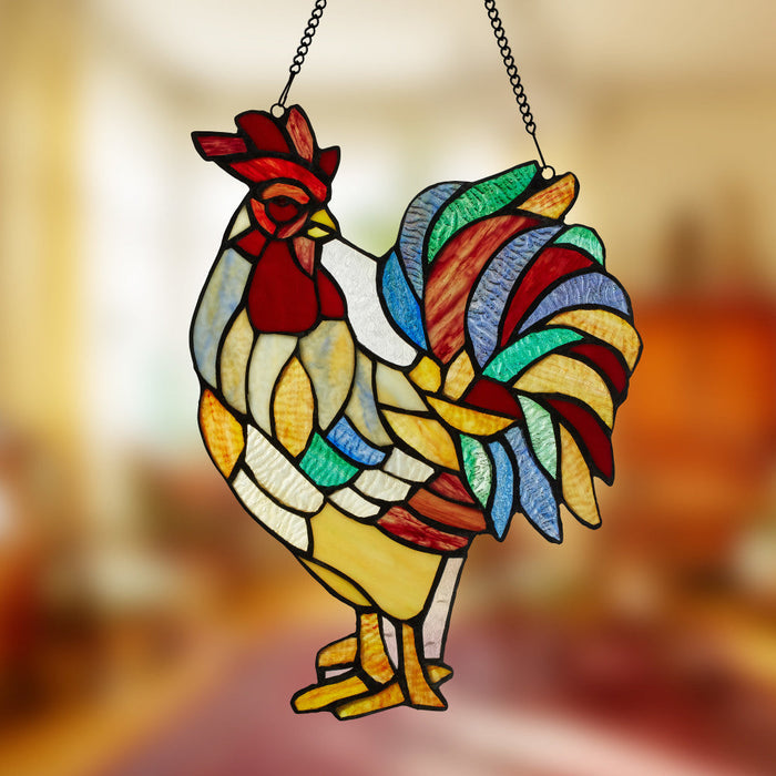 15.25"H Rusty the Rooster Stained Glass Window Panel hanging against a blurred background