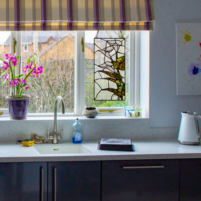 16" H Calla Lilies Design Stained Glass Window Panel in a kitchen scene with a window, striped valance, sink, countertop items, and a white kettle.