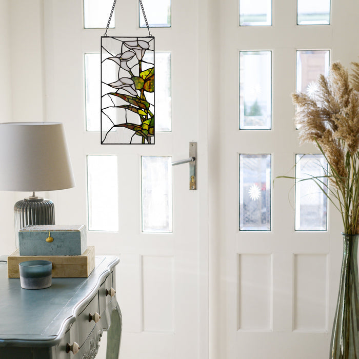 16" H Calla Lilies Design Stained Glass Window Panel in a bright, modern entryway next to a blue-gray console table and a vase of pampas grass.