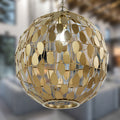 16" W Abby Glam Gold Globe Shade Pendant Light with Oval Metal Cutouts in a blurred indoor background