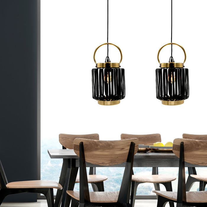 16"H Ford Lantern 1-Light Metal Pendants hanging above a dining table with wooden chairs.