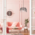 19.5" W Lisa Industrial Black and White Dome Shade Pendant in a modern living room with pink walls, a pink sofa, and decorative elements.