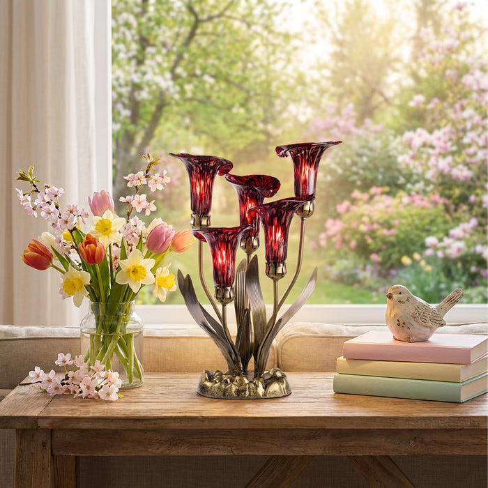 20"H Hand Blown Glass 5 Calla Lily Uplight Accent Lamp on a wooden table with flowers and books in the background.