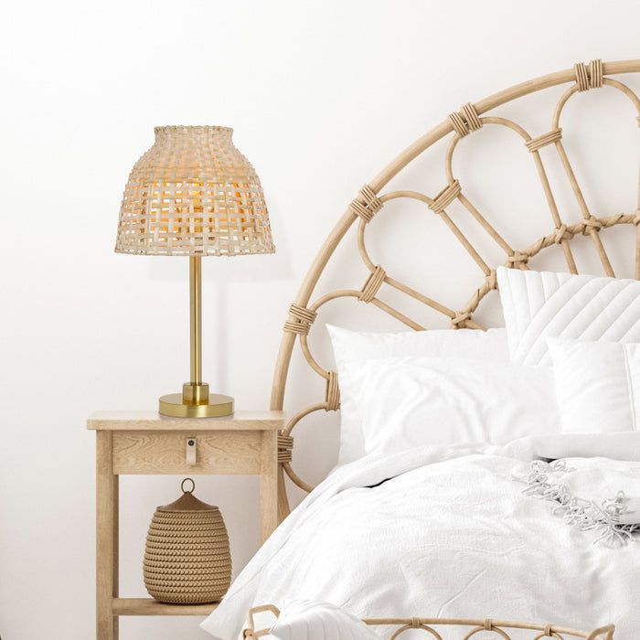20"H Shayne Natural & Gold Bamboo Shade Table Lamp on a nightstand in a bedroom.