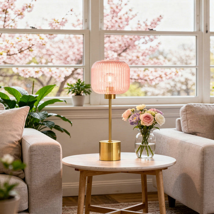 21"H Eagan Globe Shade Table Lamp in a living room with flowers and a couch.