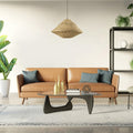 22" W 1-Light Minka Metal and Jute Pendant Light in a modern living room with a brown sofa, coffee table, and decorative items.
