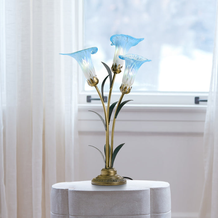 23.5"H Hand Blown Glass 3 Calla Lily Uplight Accent Lamp on a white surface in front of a window with drapes