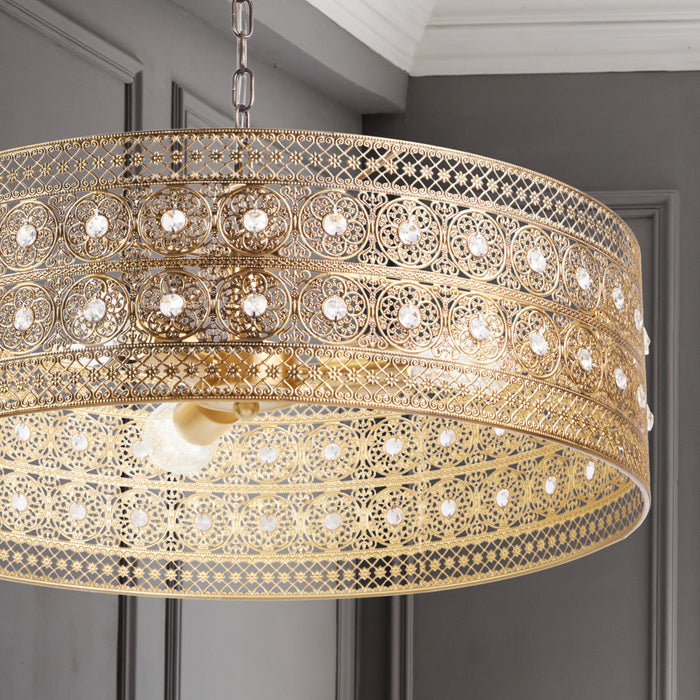 23.5"W Bryar Brass and Crystal 3-Light Chandelier hanging in a room with a neutral background