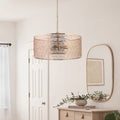 24" 3-Light Giselle Chandelier Polished Gold hanging above a wooden console table with decorative items in a room.
