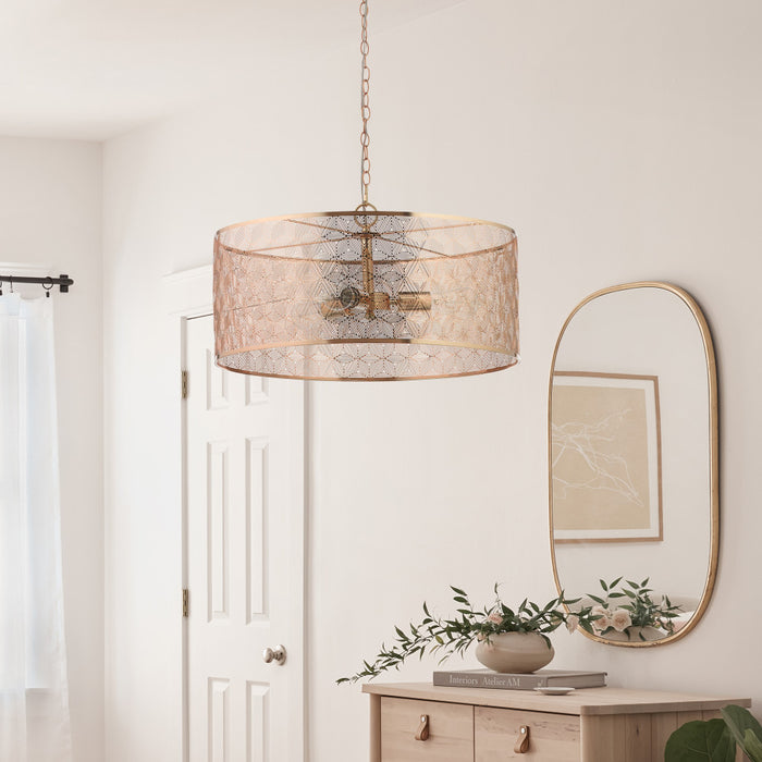 24" 3-Light Giselle Chandelier Polished Gold hanging above a wooden console table with decorative items in a room.
