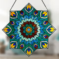 24"H Tiffany Style Stained Glass Peacock Star Window Panel on a blurred background