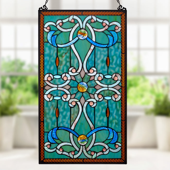26"H Tiffany Style Stained Glass Brandi's Window Panel, shown hanging against a blurred window and plant background.