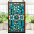 26"H Tiffany Style Stained Glass Brandi's Window Panel, shown hanging against a blurred window and plant background.
