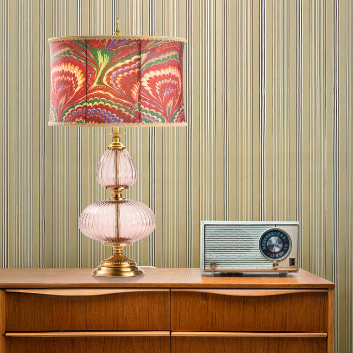 31.5" H Dash Red Printed Drum Shade Geometric Pink Glass Table Lamp on a wooden cabinet against striped wallpaper.