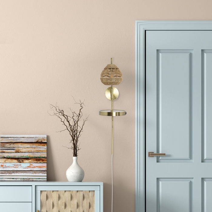 32.75"H Candlestick Wall Sconce with Tan Rattan Shade next to a light blue door and wooden cabinet.