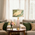 33" H Romance Pink/Green Drum Shade Geometric Glass Table Lamp on a table in a living room setting.