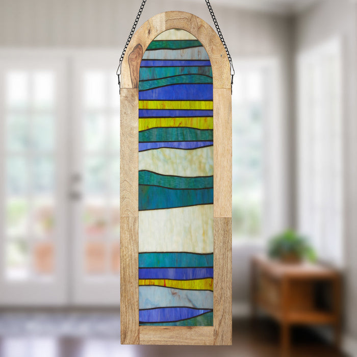 36" H Oversized Geometric Stained Glass Window Panel hanging in a blurred out room.