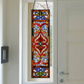 36"H Victorian Stained Glass Fleur De Lis Window Panel hanging in a front entry window.
