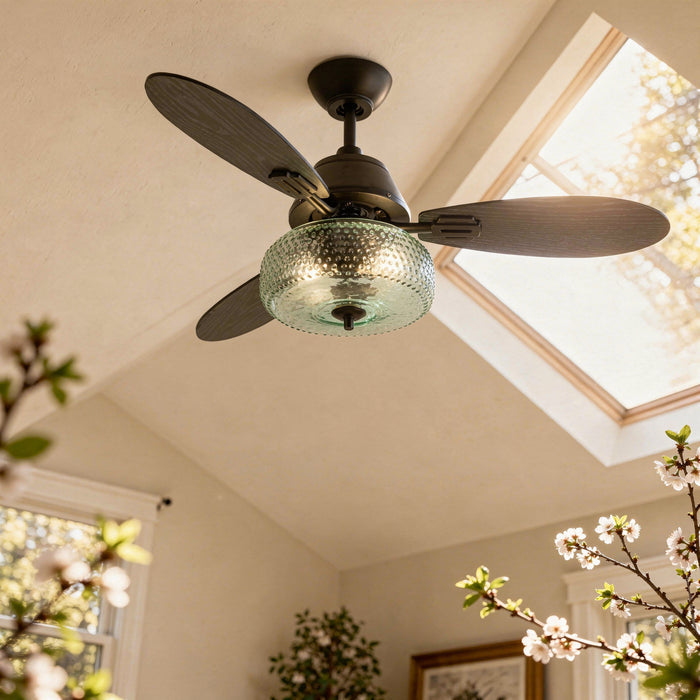 42" W Cecile LED Indoor Hand-Blown Seafoam Green Glass Shade with Dot Texture Ceiling Fan with Remote Control in a room with windows and plants