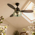 42" W Cecile LED Indoor Hand-Blown Seafoam Green Glass Shade with Dot Texture Ceiling Fan with Remote Control in a room with windows and plants
