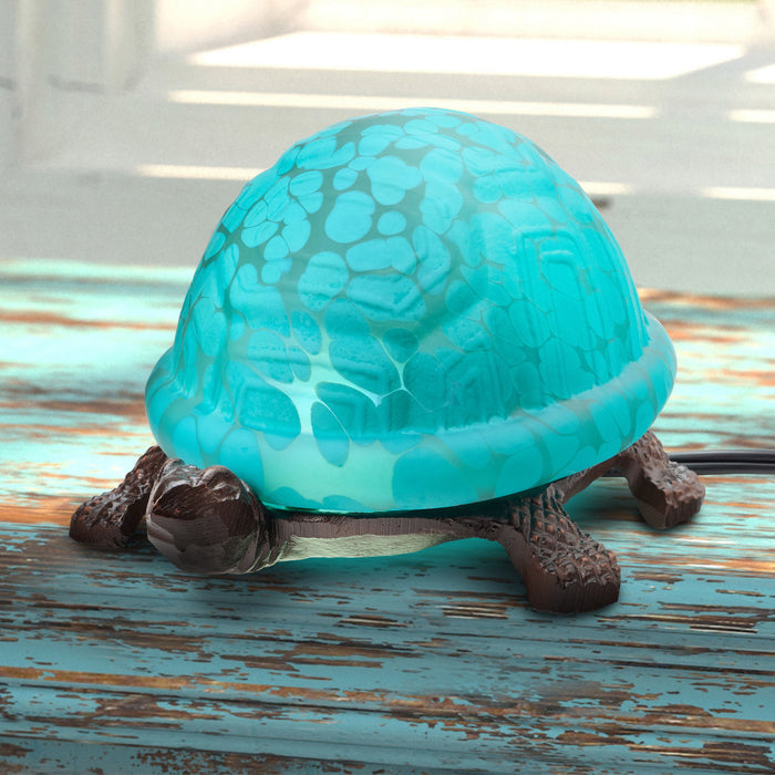 4.75" H Raphael Aqua Glass Accent Lamp on a wooden surface