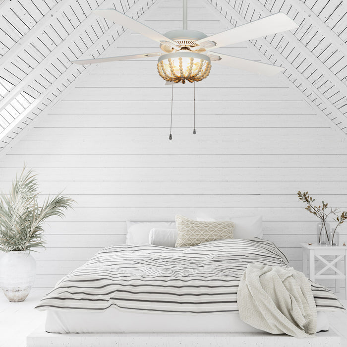 52"W Wooden Chandelier 5-Blade LED Ceiling Fan in a modern bedroom with decorative elements.