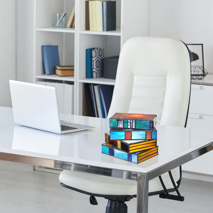 5.75" H Multi-Colored Book Stack Stained Glass Accent Lamp in a modern office desk with laptop and chair in a bright room.