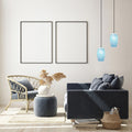 6" W Austin Glam White and Blue Glass Globe Shade Pendant Light hanging in a modern living room with a gray sofa, wicker chair, and decorative elements.