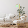 63"H Rowan Globe Shade Floor Lamp in a living room with a white sofa and wicker chair