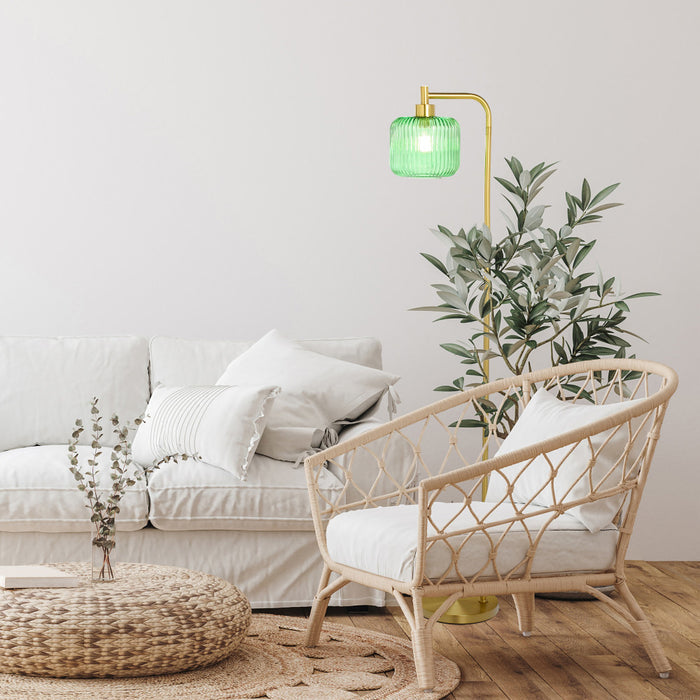 63"H Rowan Globe Shade Floor Lamp in a living room with a white sofa and wicker chair